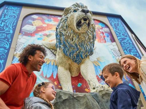 Family at the entrance to LEGO® MYTHICA: World of Mythical Creatures at LEGOLAND Windsor