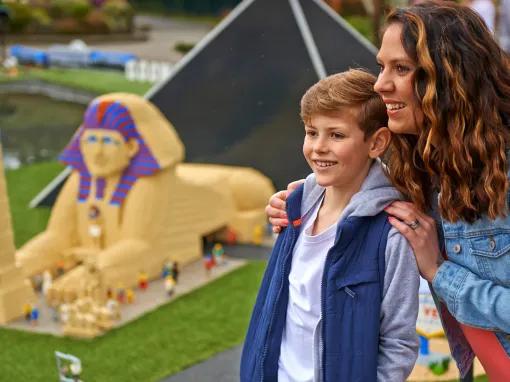 Mother and son exploring Miniland at the LEGOLAND Windsor
