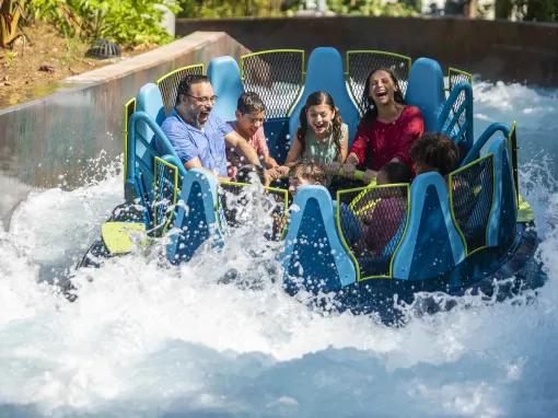 Guests getting wet on Infinity Falls at SeaWorld Orlando