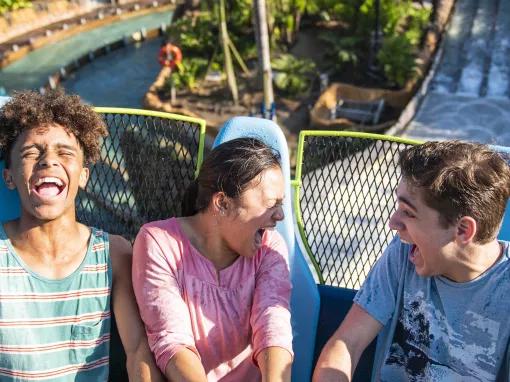 Teens riding Infinity Falls at SeaWorld Orlando