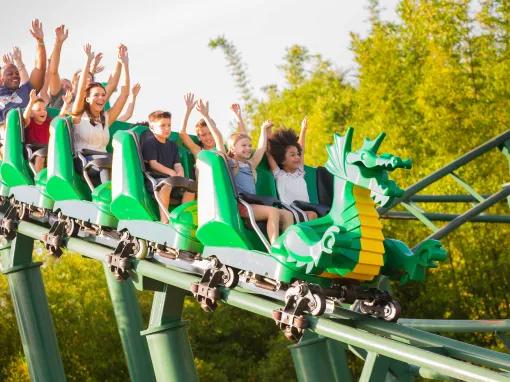 Guests enjoying The Dragon coaster at LEGOLAND Florida