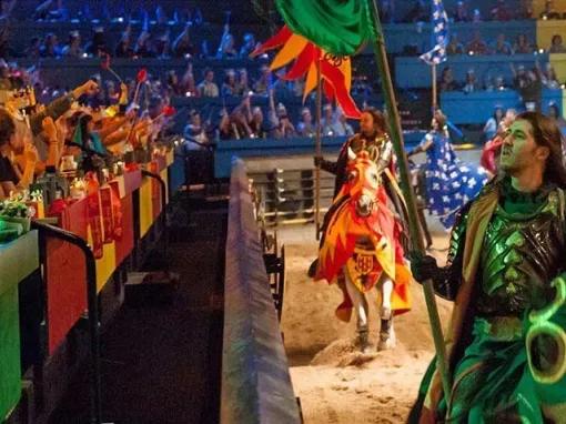 Knights riding horses in the arena at Medieval Times Orlando Dinner Show & Tournament 