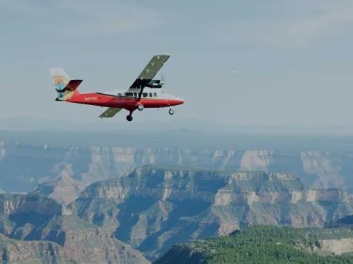 Grand Discovery Rim plane flying through the sky