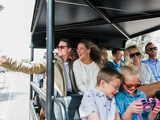 People riding the hummer through the Grand Canyon 
