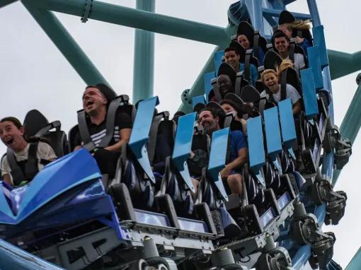 Guests riding Electric Eel roller coaster at SeaWorld San Diego in California