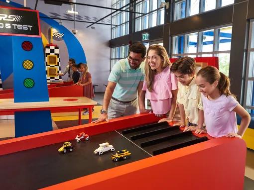 Family building and testing LEGO Cars at LEGOLAND Dubai