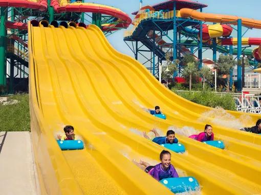 Guests racing on LEGO Slide Racers at LEGOLAND Water Park in Dubai