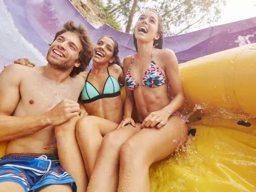 Guests enjoying a raft slide at Costa Caribe Water Park at PortAventura World