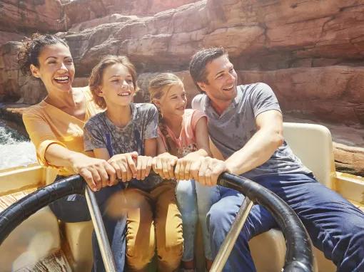 Guests riding Gran Canyon Rapids at PortAventura theme park