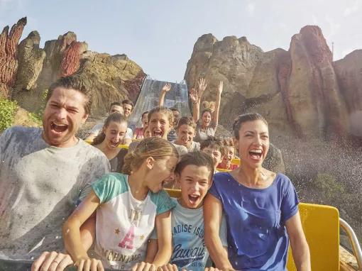 Guests riding Tutuki Splash at PortAventura theme park