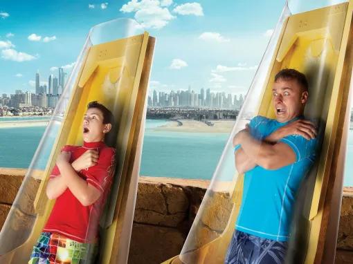 Friends braving Poseidon's Revenge drop slide at Aquaventure Dubai