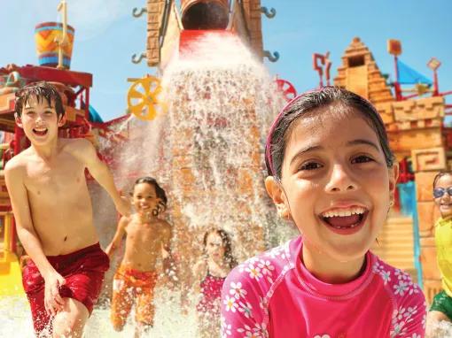 Kids playing in Splashers Mountain at Aquaventure Dubai