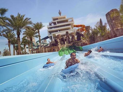 Guest sliding down Hydra Racers at Aquaventure Dubai