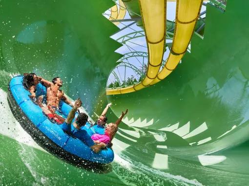 Friends riding Aquaconda water slide at Aquaventure Dubai