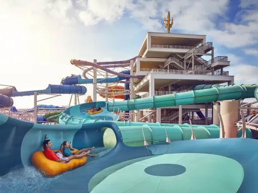 Guests riding Medusa's Lair water slide at Aquaventure Dubai