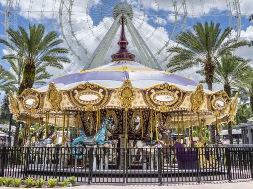 Carousel in front of the Icon Orlando Wheel