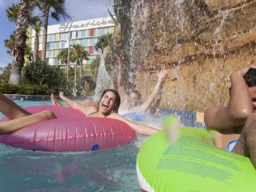 Guests in pool at Universal’s Cabana Bay Beach Resort