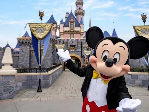 Mickey Mouse in front of Sleeping Beauty Castle, Disneyland Park in California