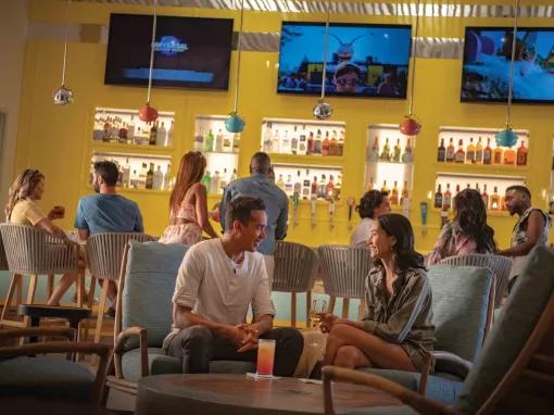 Guests relaxing at the bar, Universal's Endless Summer Resort - Dockside Inn and Suites