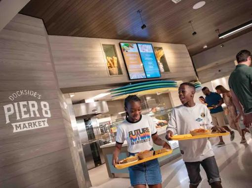 Kids grabbing a meal at Pier 8 Market, Universal's Endless Summer Resort - Dockside Inn and Suites