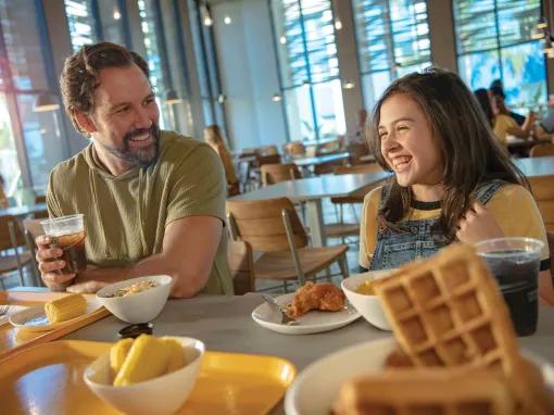 Father and daughter having breakfast at the Universal's Endless Summer Resort - Dockside Inn and Suites
