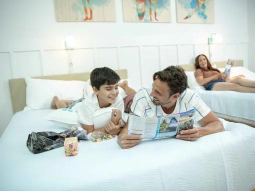 Family in standard room at Universal's Endless Summer Resort – Surfside Inn and Suites