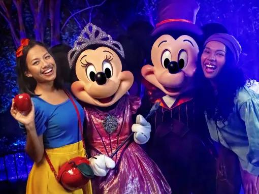 Guests with Mickey and Minnie at Mickey's Not So Scary Halloween Party