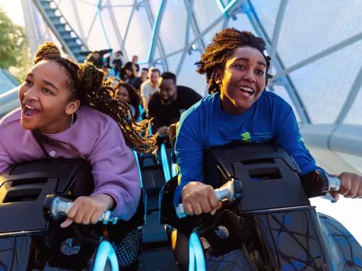 Guests on TRON Lightcycle / Run at Magic Kingdom Park