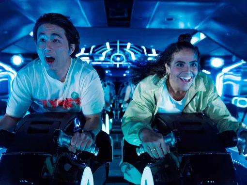 Guests on TRON Lightcycle / Run at Magic Kingdom Park