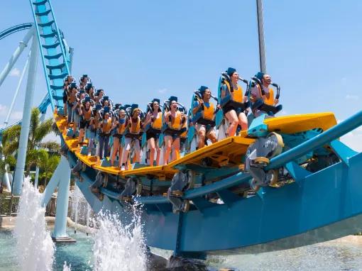 Guests riding Pipeline: The Surf Coaster at SeaWorld Orlando