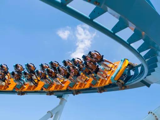 Guests riding Pipeline: The Surf Coaster at SeaWorld Orlando