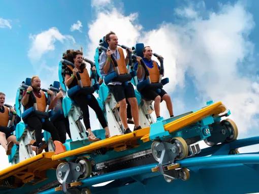 Guests riding Pipeline: The Surf Coaster at SeaWorld Orlando