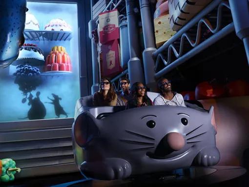 Guests riding Ratatouille: The Adventure