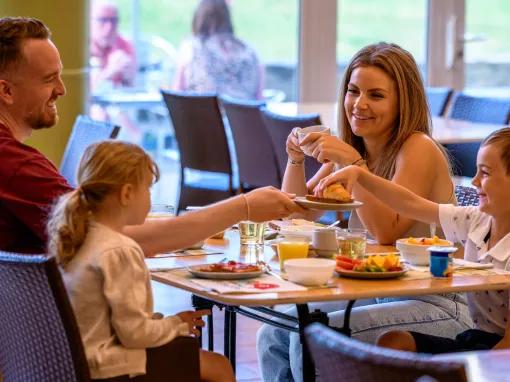 Family enjoying breakfast at Explorers Hotel Marne-la-Vallée