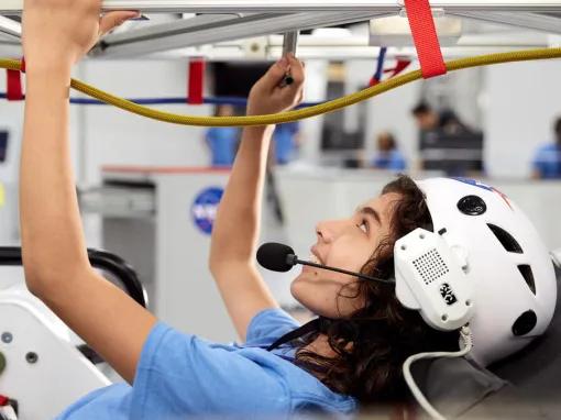 Guest experiencing ATX Microgravity Simulator 5 at Kennedy Space Center Visitor Complex