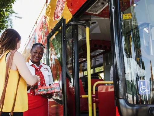 rep-welcoming-guest-on-bus