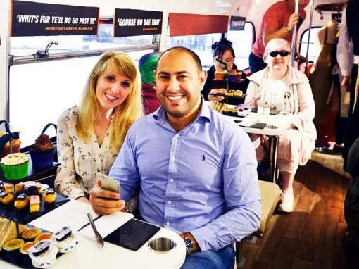 couple-enjoying-tea-and-cakes