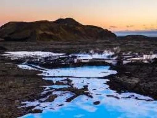 water-by-volcano-sunset