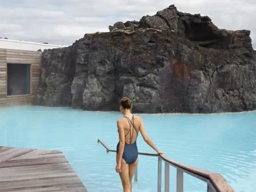 woman-walking-into-pool