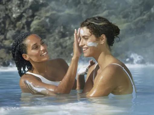 women-putting-on-mask