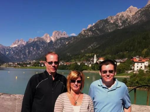 people-by-lake-and-mountain