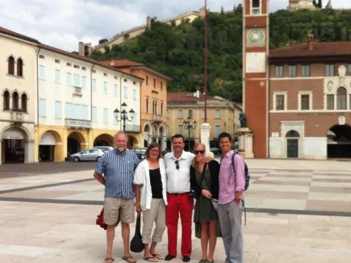 people-posing-for-photo-in-square