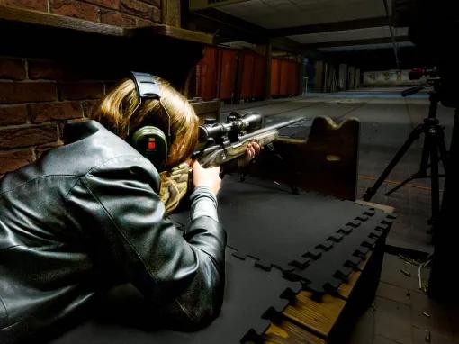 person-lying-down-with-gun