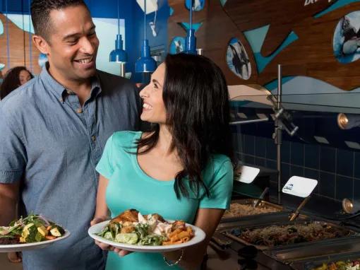 Guests enjoying Dine With Orcas Experience at Seaworld Orlando