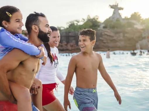 Guests in wave pool, Disney H2O Glow Nights at Disney’s Typhoon Lagoon