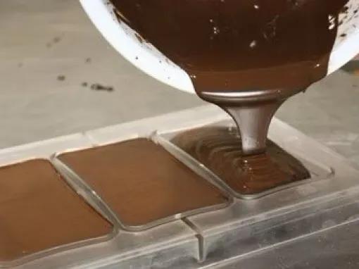 pouring-chocolate-into-moulds