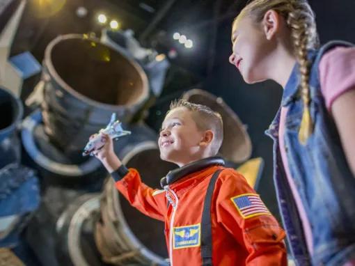 Kids exploring Space Shuttle Atlantis exhibit, Kennedy Space Center
