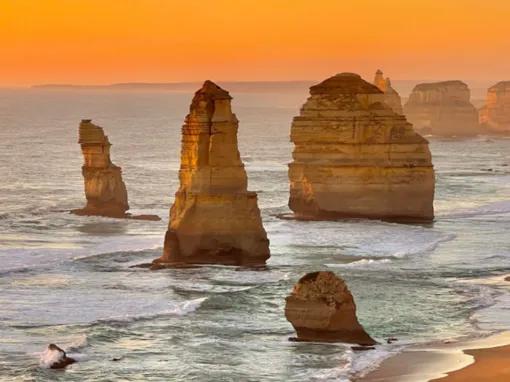 Stunning sunset over the ocean on the Great Ocean Road Sunset Tour