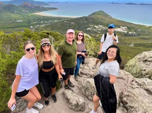 Group of people hiking along the Mount Bishop trail at Wilsons Promontory