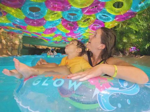 Mother and son at AquaGlow pool party at Aquatica Orlando